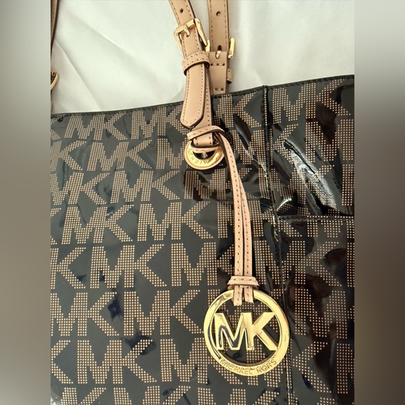 Michael Kors Black and Tan Signature Backpack - Picture 2 of 15